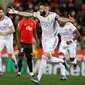 Striker Real Madrid, Karim Benzema, mencetak dua dari tiga gol kemenangan timnya atas Real Mallorca pada laga pekan ke-28 La Liga di Visit Mallorca Estadi, Selasa (15/3/2022) dini hari WIB. (AP Photo/Francisco Ubilla)