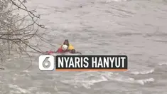 Seorang pria terjebak di derasnya sungai air terjun Niagara. Beruntung petugas keselamatan berhasil menariknya ke tepi sungai.