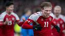 Rasmus Hojlund mencetak gol pada menit 21, 82, dan 93. (Liselotte Sabroe/Ritzau Scanpix/AFP)