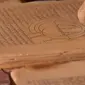 Manuskrip kuno di Syinqith, negeri dengan tradisi menghafal Al-Qur'an terbaik di dunia. (Foto: YT Kabar Pedia)