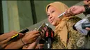 Ida Fauziah mengenakan jilbab berwarna coklat muda saat mendatangi KPK. Ia lebih memilih irit bicara saat meninggalkan gedung KPK, Jakarta, Senin (18/08/2014) (Liputan6.com/Faisal R Syam)