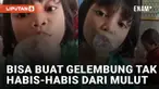 Aksi seorang bocah perempuan bisa membuat gelembung tak habis-habis dari mulutnya menarik perhatian