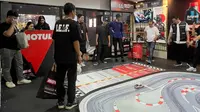 Keseruan di booth Motul Indonesia di gelaran IIMS 2025. (ist)