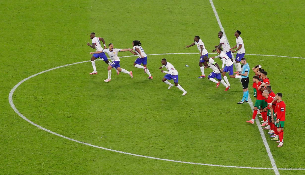 Pemenang laga perempat final Euro 2024 antara Portugal dan Prancis harus ditentukan lewat adu penalti. (Ronny HARTMANN/AFP)