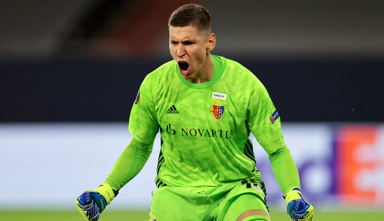 Djordje Nikolic. Kiper berusia 25 tahun dan berpostur 1,95 meter ini telah 6 musim jadi bagian FC Basel. Gagal menembus skuat utama, ia dipinjamkan selama 3 musim, 2016/2017 hingga 2018/2019 ke tiga klub, Schaffhausen, FC Thun dan FC Aarau. Musim ini ia baru tampil 2 laga. (AFP/Pool/Wolfgang Rattay)