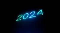 Meski tanpa pesta kembang api, namun aksi fantastis puluhan drone bertajuk Drone Light Show disajikan menghiasi langit dengan tulisan '2024, Kolaborasi Medan Berkah'