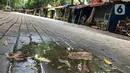 Suasana perkampungan budaya betawi Setu Babakan yang sepi pengunjung di Jakarta Selatan, Selasa (17/3/2020). Sepinya kawasan Setu Babakan merupakan imbas dari kebijakan Pemprov DKI Jakarta yang menutup sejumlah tempat wisata sebagai upaya pencehagan Covid 19. (Liputan6.com/Immanuel Antonius)
