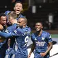 Pemain Arsenal merayakan gol yang dicetak Gabriel Magalhaes ke gawang Fulham pada laga Liga Inggris di Craven Cottage, London, Sabtu (12/9/2020) malam WIB. Arsenal menang 3-0 atas Fulham. (Ben Stansall/Pool via AP)