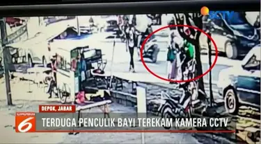 Sesosok wanita yang diduga penculik bayi di Depok, Jawa Barat, terekam CCTV sedang menghentikan ojek daring untuk diantar ke arah Terminal Depok.