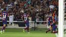Para pemain Barcelona merayakan gol yang dicetak oleh Ferran Torres ke gawang Real Betis pada laga Liga Spanyol di Estadi Olimpic Lluis Companys, Minggu (17/9/2023). Barca menang dengan skor 5-0. (AP Photo/Joan Monfort)