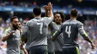 Pemain sayap Real Madrid Cristiano Ronaldo merayakan gol ke gawang Espanyol dalam lanjutan La Liga Spanyol di Power8 Stadium, Sabtu (12/9/2015). (Liputan6.com/LLUIS GENE / AFP)