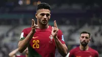 Pemain Portugal,&nbsp;Goncalo Ramos merayakan gol ketiga timnya ke gawang Swiss saat laga 16 besar Piala Dunia 2022 yang berlangsung di Lusail Stadium, Selasa (06/12/2022) waktu setempat. (AP/Manu Fernandez)