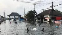Ilustrasi suasana banjir rob di dekat kawasan tanjung emas Kota Semarang (Foto :Titoisnau)