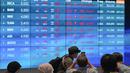 BEI sempat menghentikan sementara perdagangan (trading halt) selama 30 menit pada Selasa (8/4/2025). (BAY ISMOYO/AFP)