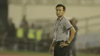 Pelatih Bali United, Widodo C. Putro, saat pertandingan melawan Madura United pada laga Piala Presiden di Stadion Manahan, Solo, Sabtu, (3/2/2018). Bali United menang adu penalti 5-4 atas Madura United. (Bola.com/M Iqbal Ichsan)