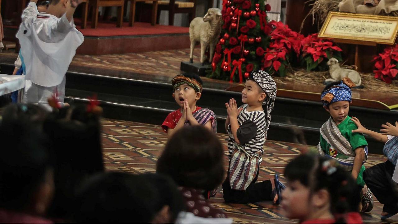 Keceriaan Anak-Anak Ikuti Misa Natal di Gereja Katedral Jakarta