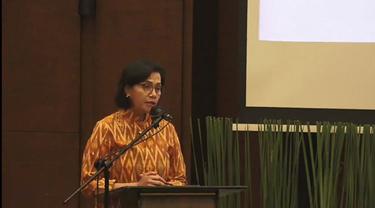 Menteri Keuangan Sri Mulyani Indrawati dalam acara kerja sama Kementerian Keuangan dan Kejaksaan Agung untuk meningkatkan pengawasan keuangan negara. (Arief/Liputan6.com)