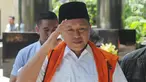 Bupati Lampung Tengah Mustafa memakai rompi tahanan tiba di gedung KPK, Jakarta, Kamis (15/3). Mustafa diperiksa sebagai tersangka terkait kasus dugaan suap untuk pinjaman daerah pada APBD Lampung Tengah 2018. (Merdeka.com/Dwi Narwoko)