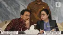 Ketua DPR Puan Maharani berbincang dengan Menteri Dalam Negeri Tito Karnavian sebelum rapat gabungan lintas kementerian dan lembaga di kompleks Parlemen, Jakarta, Rabu (4/2/2020). Rapat membahas persiapan pelaksanaan Pekan Olahraga Nasional (PON) XX tahun 2020 di Papua. (Liputan6.com/Johan Tallo)