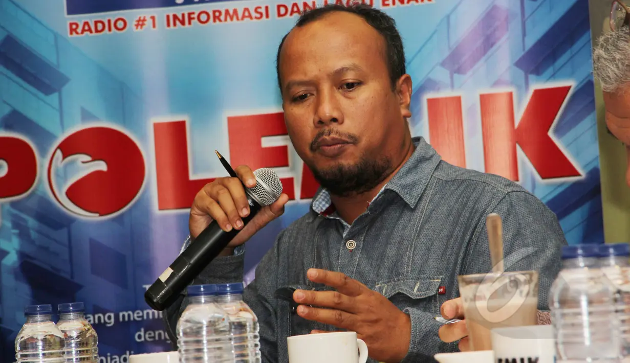 Pengurus Harian YLKI, Tulus Abadi saat menjadi pembicara dalam diskusi bertajuk 'Mau Sehat kok Repot' di kawasan Cikini, Jakarta, Sabtu (21/3/2015). (Liputan6.com/Helmi Afandi) 