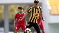 Striker Malaysia Hadi Fayyadh mencetak dua gol saat mengalahkan Timnas Indonesia U-19 di Paju Public Stadium, Paju, Senin (6/11/2017). (AFC)