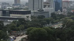 Lanskap gedung pencakar langit diambil dari kawasan Jakarta Pusat, Senin (26/9/2022). Pada Rabu (22/6), DKI menjadi yang terburuk di dunia dengan skor 163 alias tidak sehat. Di bawahnya, ada Beijing (159) dan Dhaka (157). (Liputan6.com/Johan Tallo)