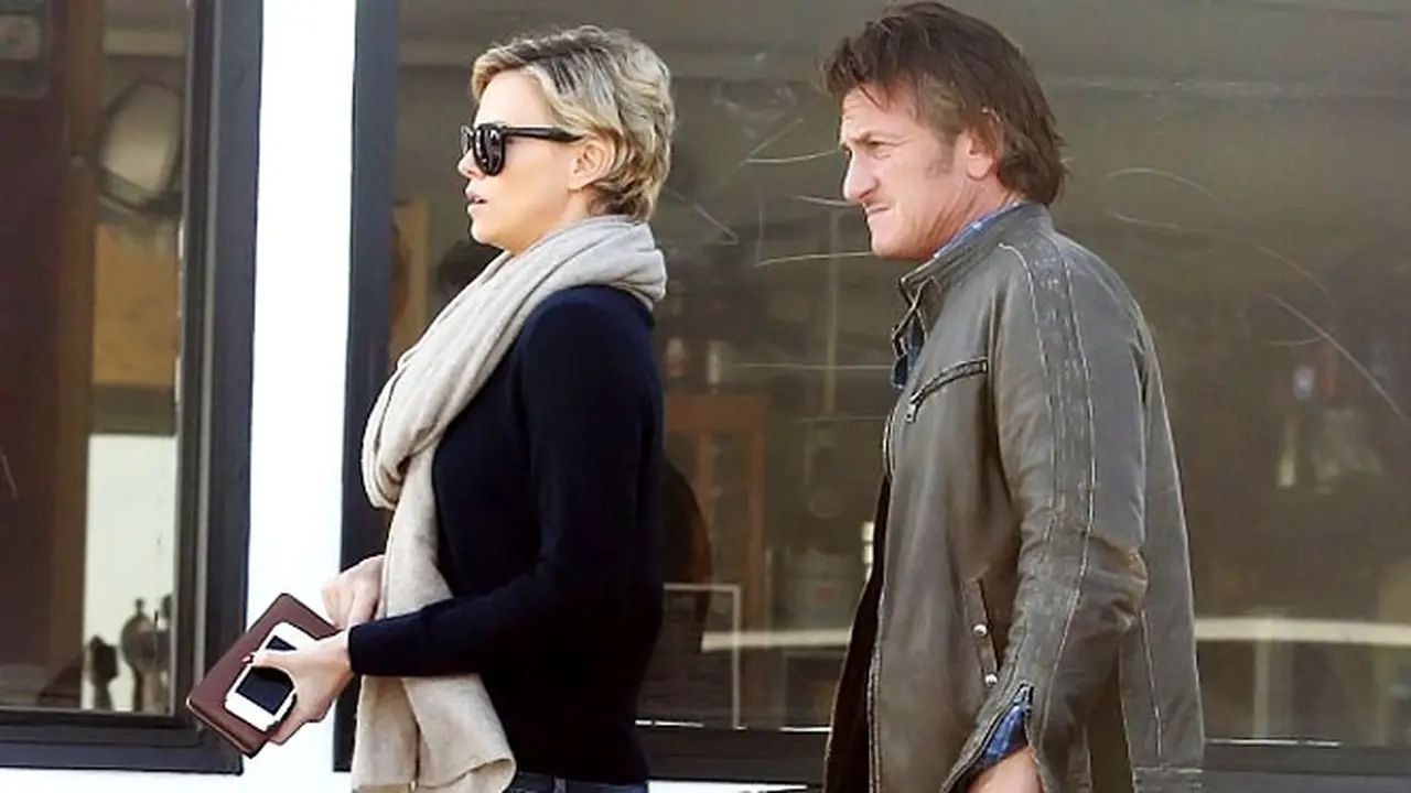 sean-penn-charlize-140211b.jpg