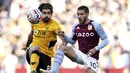 Ruben Neves. Memasuki musim kelimanya bersama Wolverhampton Wanderers usai didatangkan dari Porto pada 2017/2018, ia telah tampil dalam 185 laga dengan mencetak 21 gol dan 10 assist. Nilai pasarnya pun turun dari 45 juta euro menjadi 42 juta euro atau setara Rp.690 miliar. (PA via AP/Nick Potts)