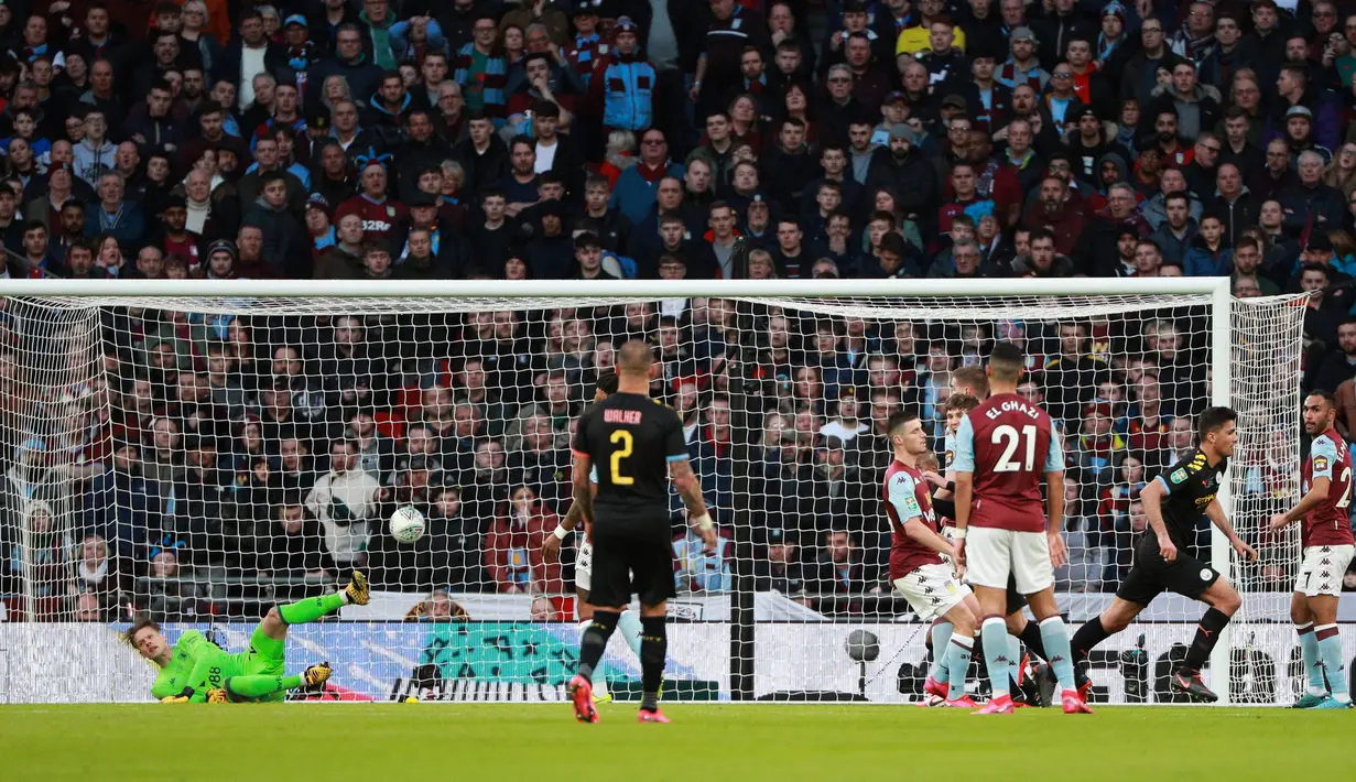 Gelandang Manchester City, Rodrigo berlari merayakan gol yang dicetaknya ke gawang Aston Villa pada laga final Piala Liga Inggris di Stadion Wembley, Minggu (1/3/2020). Manchester City memastikan trofi Piala Liga Inggris ketiga secara beruntun setelah menang 2-1 atas Aston Villa. (AP/Ian Walton)