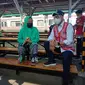 Menhub Budi Karya Sumadi memantau pergerakan penumpang pada KRL Jabodetabek di Stasiun Manggarai, Jakarta pada hari kedua Lebaran, Jumat (14/5/2021). Dok: Maulandy R/Liputan6.com
