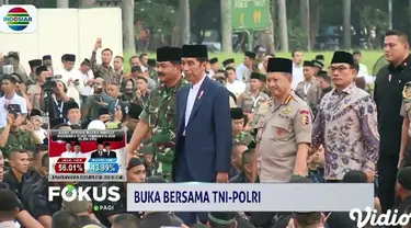 Presiden Jokowi Jokowi dan Ibu Negara Iriana Joko Widodo menghadiri acara buka puasa bersama yang digelar keluarga besar TNI-Polri di Monas, Jakarta Pusat, Kamis petang.