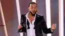 <p>John Legend tampil pada ajang penghargaan Latin Grammy Awards 2022 di Michelob Ultra Arena, Las Vegas, Nevada, Amerika Serikat, 17 November 2022. (Kevin Winter/Getty Images for The Latin Recording Academy/AFP)</p>