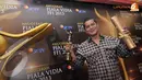 Gunung Nusa Pelita pemenang Pengarah Sinematografi dalam malam Anugerah Piala Vidia FFI 2013 dalam filmnya yang berjudul 'Miskin Susah Kaya Susah' (Liputan6.com/Andrian M Tunay)
