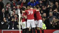 Pemain MU melakukan selebrasi usai jebol gawang Tottenham (AP)