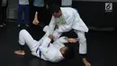 Atlet pelatnas Jiu Jitsu putra melakukan latihan di Kawasan Patal Senayan, Jakarta, Selasa (10/4). Rencananya, timnas Jiu Jitsu Indonesia akan berangkat ke Abu Dhabi untuk uji coba pada pertengahan April 2018. (Liputan6.com/Helmi Fithriansyah)