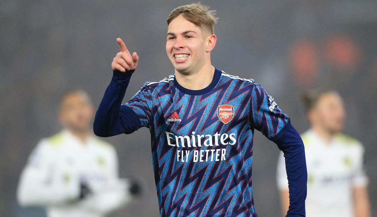 Pemain Arsenal, Emile Smith Rowe, melakukan selebrasi setelah mencetak gol ke gawang Leeds United pada laga Liga Inggris di Stadion Elland Road (18/12/2021). Efek cedera panjang membuat Emile Smith Rowe belum kembali ke performa terbaik. Dia bisa dilepas jika tidak menunjukkan peningkatan yang signifikan. (AFP/Lindsey Parnaby)