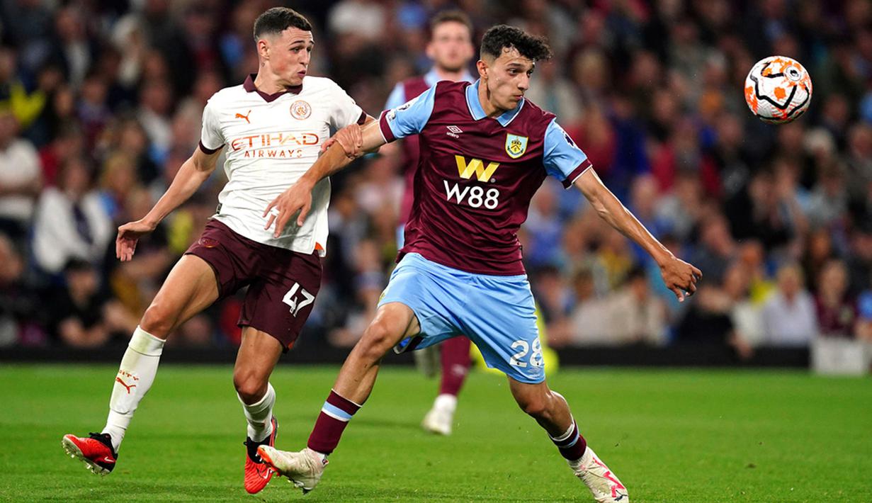 <p>Juara bertahan Manchester City mengawali Liga Inggris musim 2023/2024 dengan gemilang. Berkat brace dari striker Erling Haaland dan satu gol dari Rodri, Manchester City sukses mencukur tuan rumah Burnley 3-0. (Mike Egerton/PA via AP)</p>