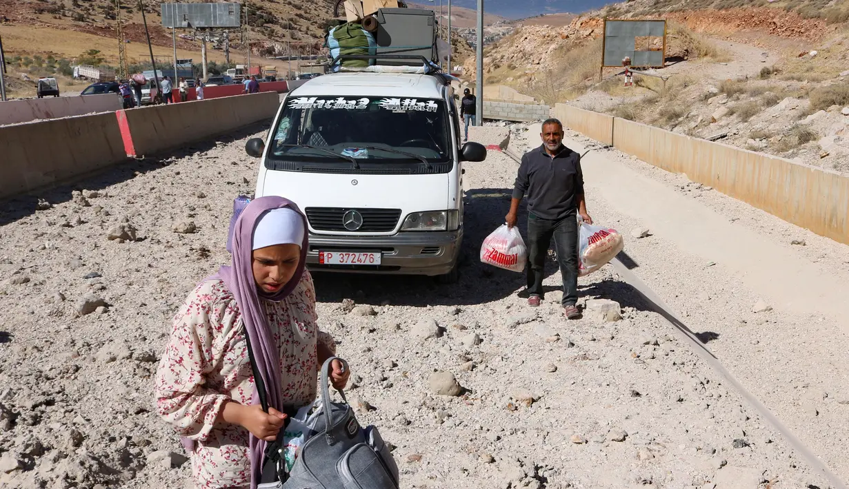 Sebelumnya, Pasukan Pertahanan Israel (IDF) pada hari Kamis 3 Oktober 2024, menuding Hizbullah menggunakan penyeberangan itu untuk mengangkut peralatan militer ke Lebanon. (HASSAN JARRAH/AFP)
