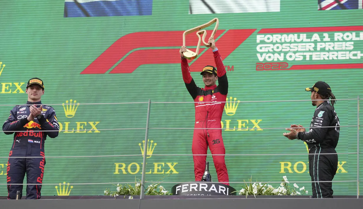 Pembalap Scuderia Ferrari, Charles Leclerc, berhasil merebut kemenangan dalam balapan Formula 1 GP Austria di Sirkuit Red Bull Ring, Spielberg, pada Minggu (10/7/2022). Pembalap asal Monako ini diikuti oleh pembalap Oracle Red Bull Racing, Max Verstappen, di posisi kedua, dan pembalap Mercedes AMG Petronas, Lewis Hamilton, di posisi ketiga. (AP Photo/Matthias Schrader)