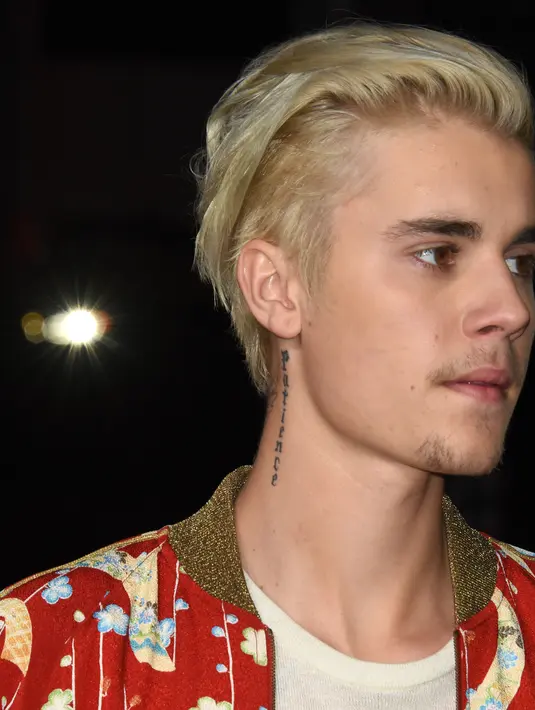 "Gaya rambut Zac Efron sekilas mirip dengan rambut Justin Bieber yang pirang," tulis netizen. (AFP/Bintang.com)