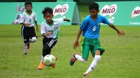 Pertandingan Milo Football Championship 2019 di Lapangan Kodam V/Brawijaya, Surabaya, Minggu (24/3/2019). (Bola.com/Aditya Wany)