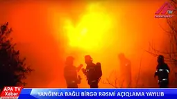 Regu pemadam kebakaran dikerahkan ke sebuah pusat rehabilitasi pecandu narkoba di Ibu Kota Baku, Azerbaijan, Jumat (2/3). Kebakaran diduga terjadi akibat gangguan  pada jaringan listrik di bangunan utama kompleks rehabilitasi tersebut. (APA TV via AP)