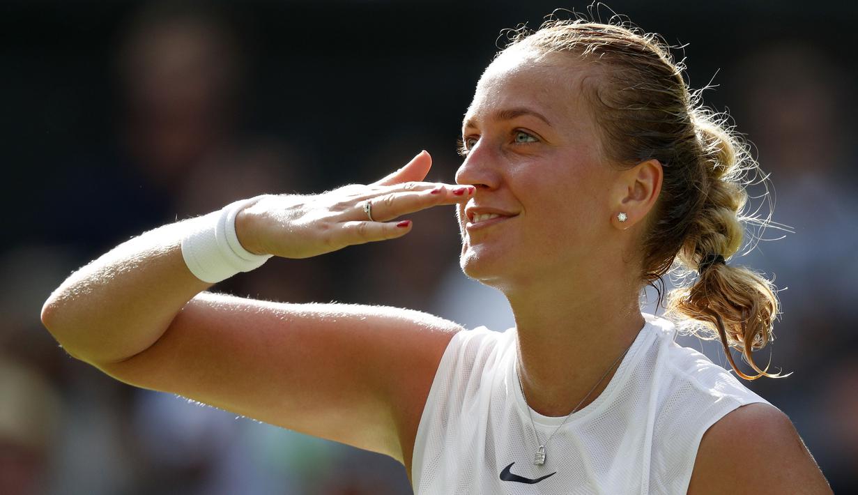 Pada 2011 petenis Republik Cheko, Petra Kvitova  merebut gelar Wimbledon setelah mengalahkan Maria Sharapova 6-3, 6-4 di Final. (AFP/Adrian Dennis)