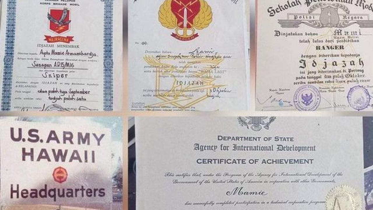 Salah satunya ialah ijazah pendidikan menembak yang menyatakan Mami telah lulus sebagai seorang sniper.