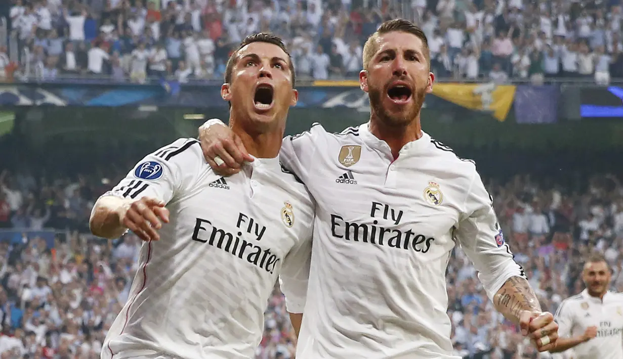 Cristiano Ronaldo merayakan golnya bersama Sergio Ramos. (Reuters / Juan Medina)