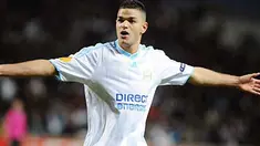 Selebrasi gol yang khas dari gelandang Olympique Marseille Hatem Ben Arfa di laga Europa League melawan FC Copenhagens di Velodrome Stadium, 25 Februari 2010. AFP PHOTO / GERARD JULIEN 