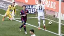 Selebrasi penyerang Barcelona, Lionel Messi usai mencetak gol pada pertandingan melawan Deportivo (AFP PHOTO / JOSEP LAGO)