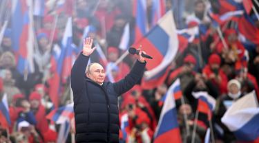 Ekspresi Vladimir Putin saat Perayaan 8 Tahun Rusia Merebut Krimea