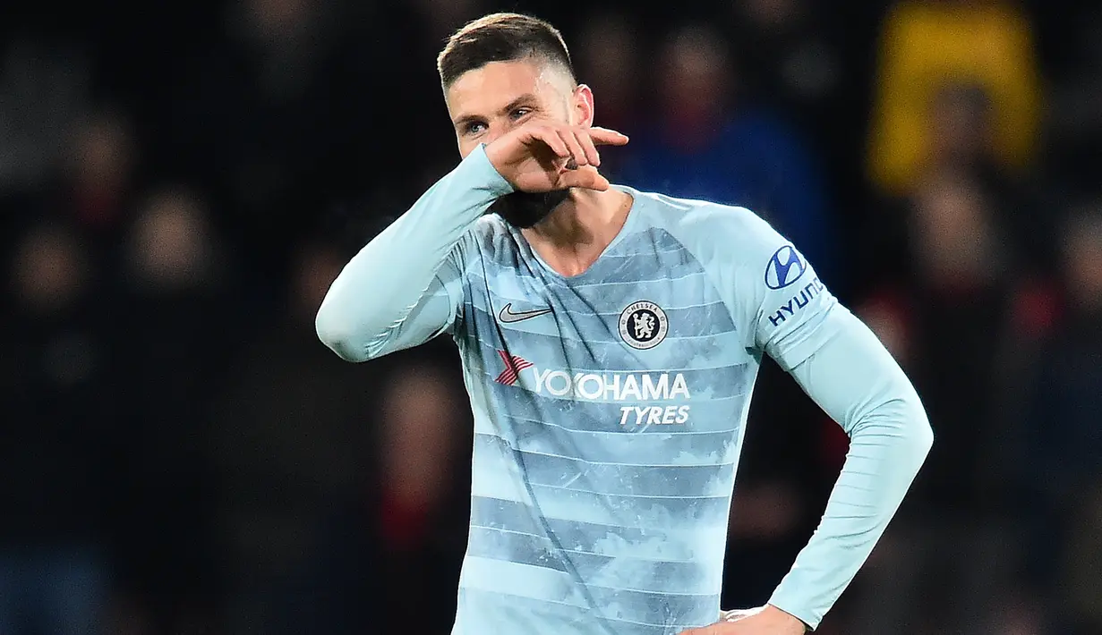 Ekspresi striker Chelsea, Olivier Giroud saat timnya kalah dari Bournemouth pada lanjutan pekan ke-24 Premier League 2018-2019 di Bournemouth, Inggris, Rabu (30/1). Chelsea kalah 4-0. (Glyn KIRK/AFP)