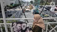 Aktivitas proyek pembangunan Mass Rapid Transit (MRT) Fase 2A Bundaran HI-Harmoni di Jalan MH Thamrin, Jakarta, Senin (14/3/2022). Proyek MRT Fase 2A ditargetkan rampung pada 2025. (merdeka.com/Iqbal S. Nugroho)